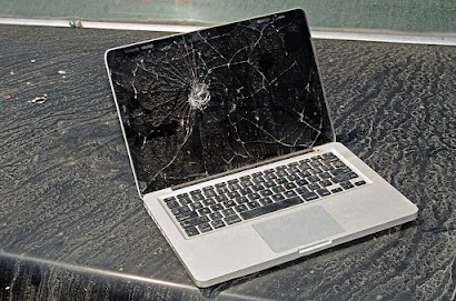 Broken laptop, repaired at Gravity an Apple Authorized Service Provider in Columbia MO